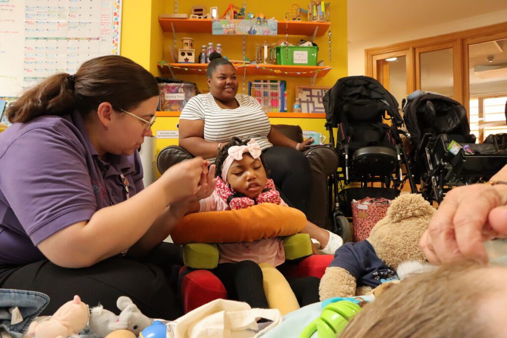 Keech Hospice Play Worker with Child Patient at Play Session