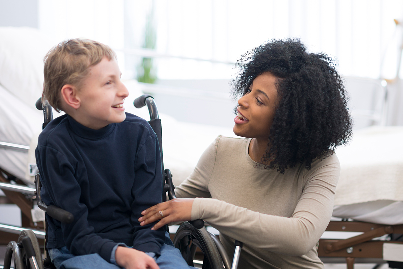 Volunteer Care Worker with Child