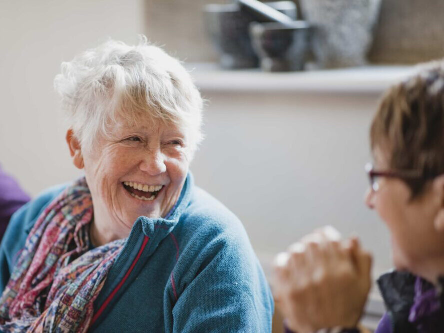 Laughing Woman 1156430267 scaled e1734443798158 1 aspect ratio 400 300