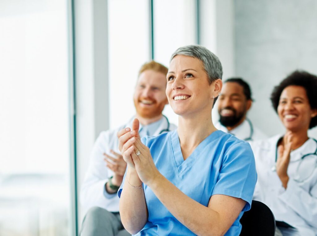 Portrait,Of,A,Young,Doctors,And,Nurses,In,Audiance,During