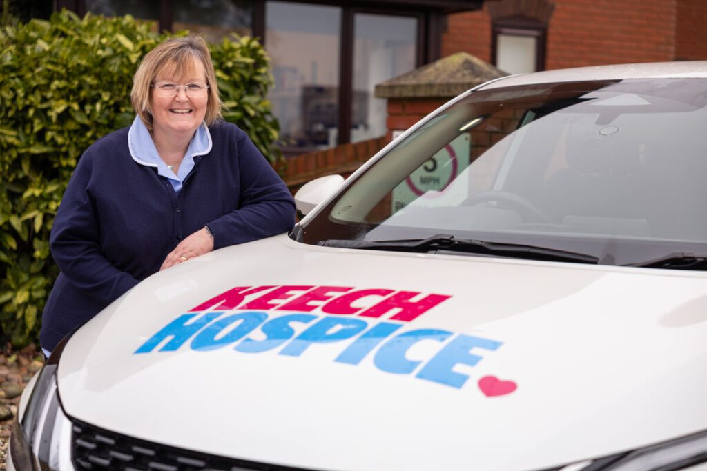 Keech nurse with branded car